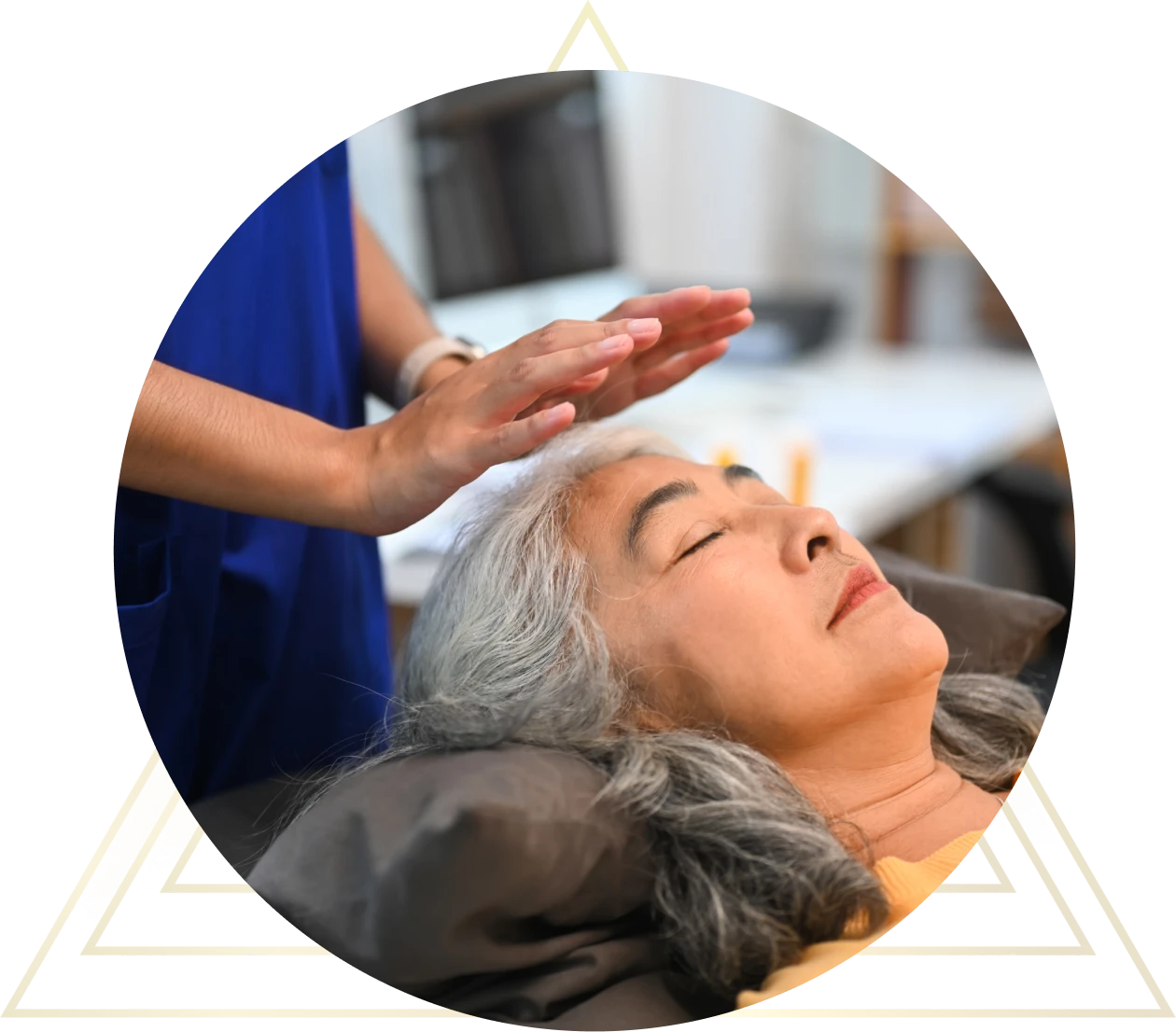 Woman receiving reiki therapy session