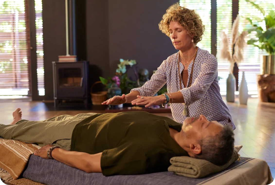 Woman performing energy healing therapy